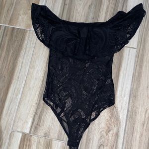 Black knitted off shoulder body suit